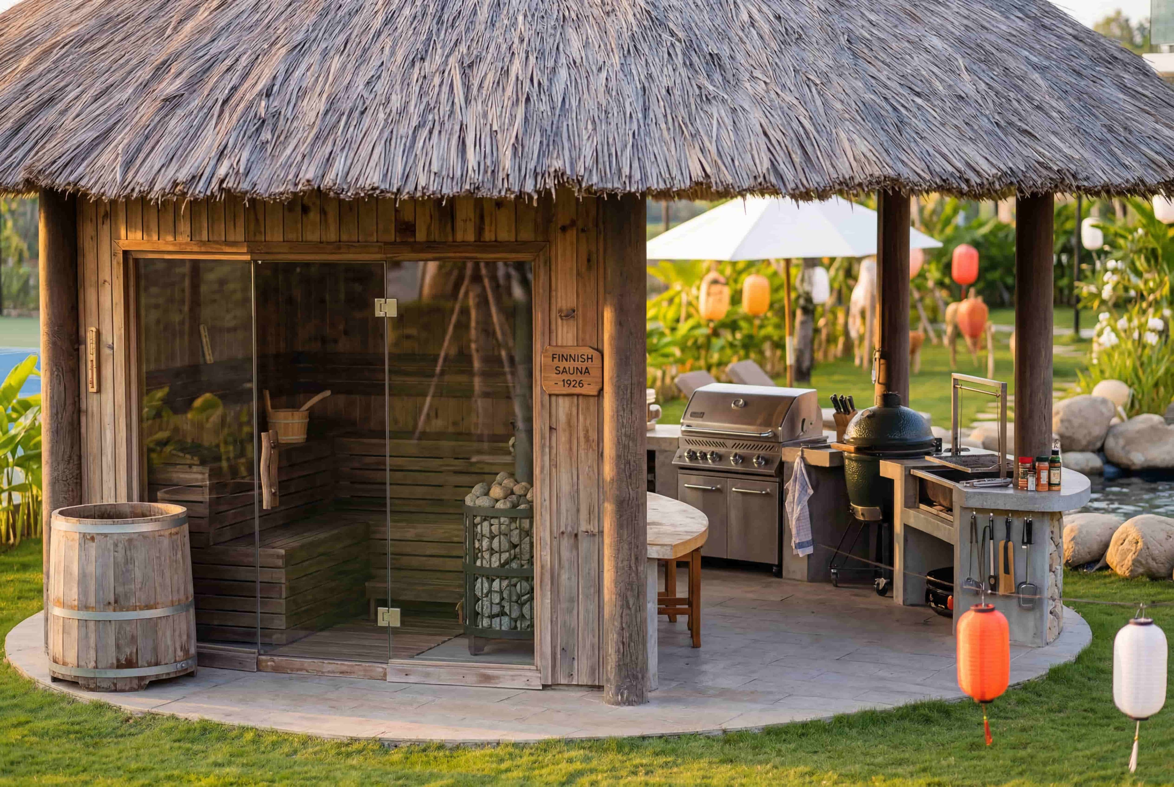 Finnish sauna and outdoor BBQ grill pavilion with thatched roof