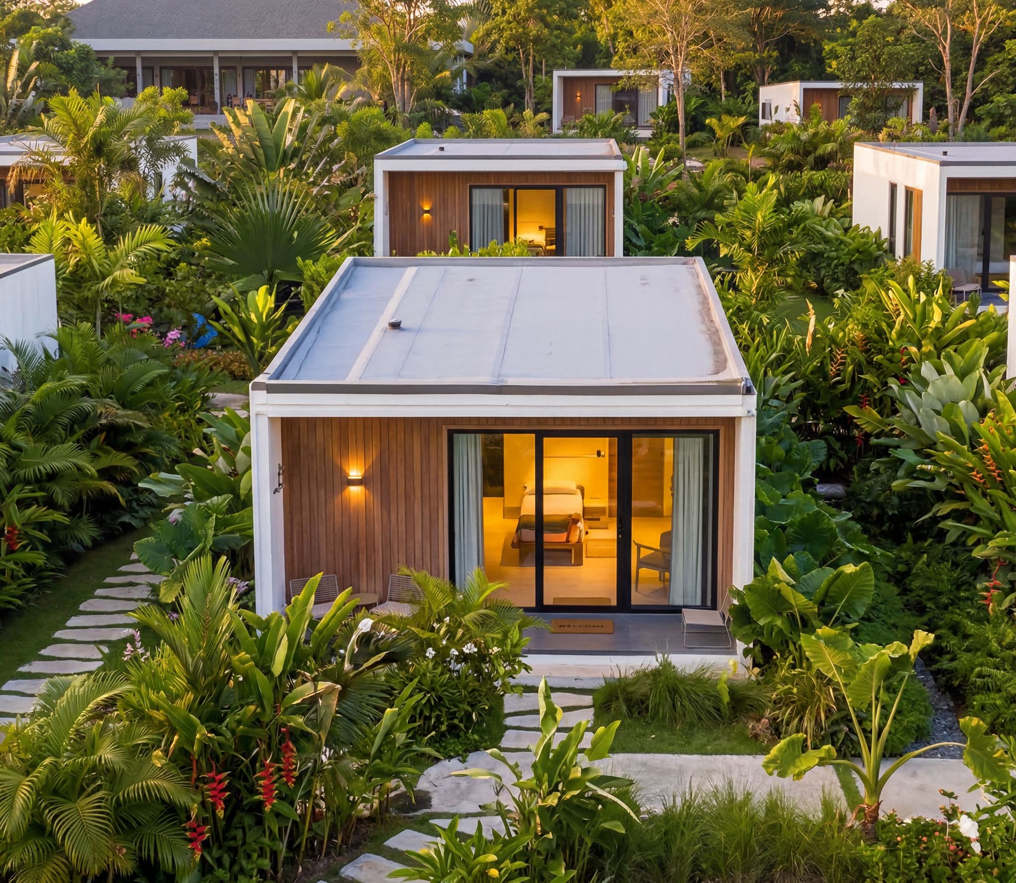 Sportkation Mekong Delta — Private Cabins: White stucco & warm teak